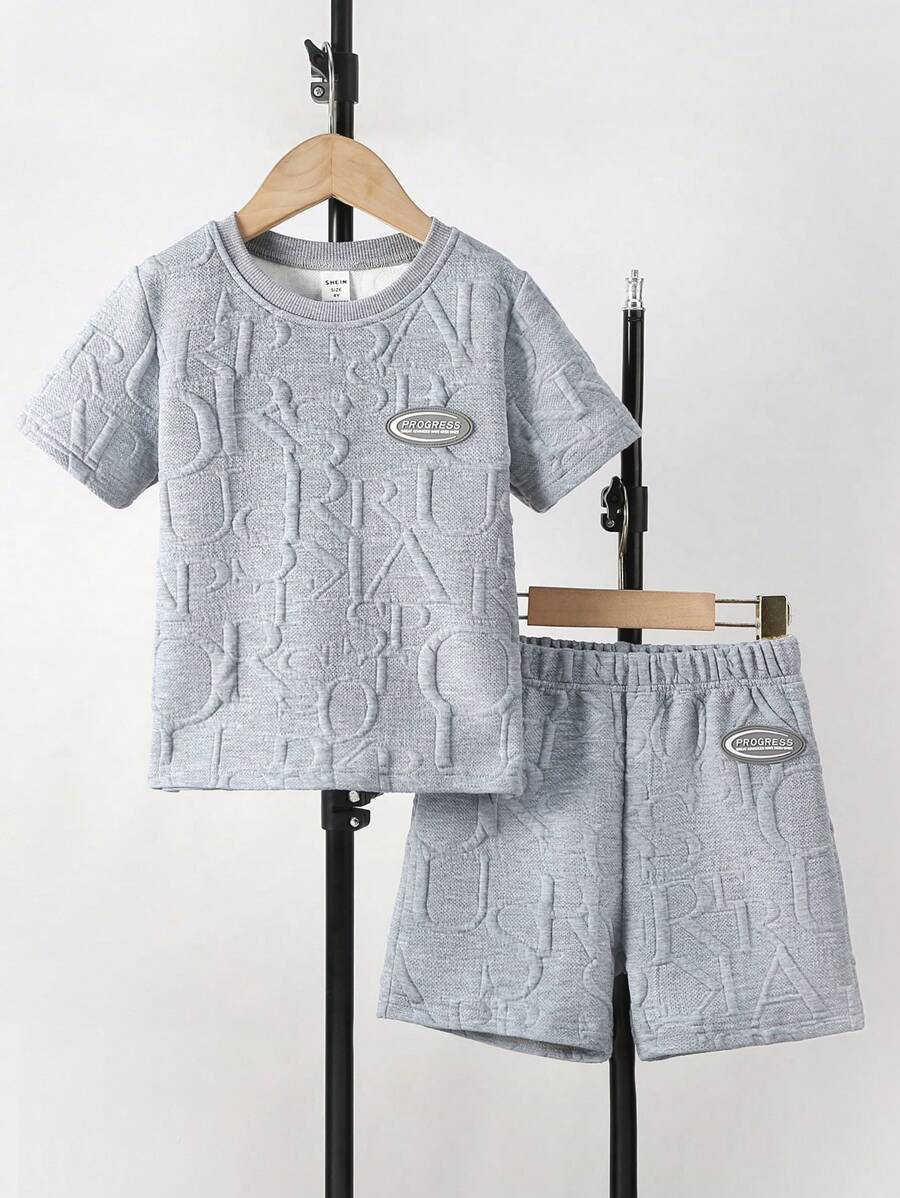 SHEIN 2 pezzi, set di maglietta ampia e comoda e pantaloncini per ragazzo giovane, stile casual e carino, adatto per scuola, feste, attività all'aperto, sport, abbigliamento da gentiluomo, per ragazzi di 4-7 anni, colore grigio