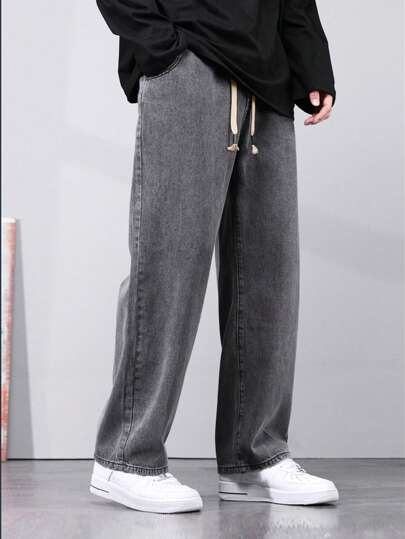 Jeans droits avec cordon de serrage à la taille et poches pour hommes