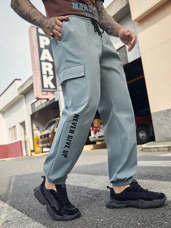 GENTILAND Men Slogan Graphic Flap Pocket Side Drawstring Waist Cargo Pants