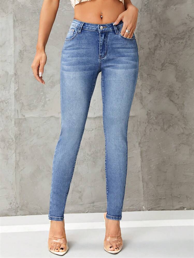 SHEIN Essnce Jeans ajustados con bolsillo oblicuo - Lavado ligero - Ver 1
