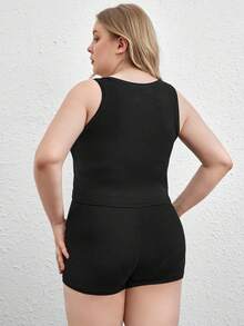 Camiseta sin mangas de cuello redondo y talla grande en negro, elástica y cómoda con costillas