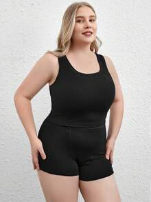 Camiseta sin mangas de cuello redondo y talla grande en negro, elástica y cómoda con costillas