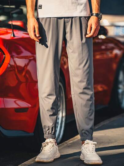 Men Solid Drawstring Waist Trousers