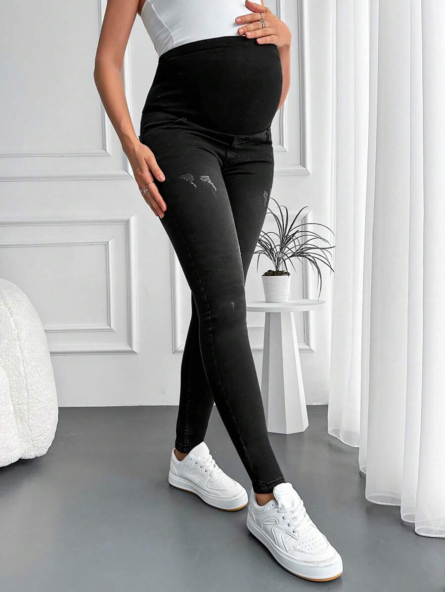 RueChic Maternity Wideband Waist Ripped Frayed Skinny Jeans - Black - View 1