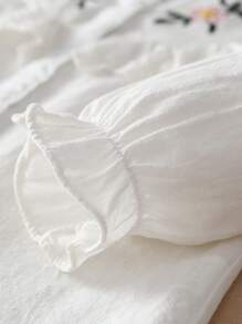 青少女春秋花卉刺繡折領長袖襯衫，校園風格上衣