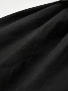 Cozy Pixies Đứa bé gái Cổ áo tương phản tay áo lá sen Nơ mặt trước Váy 2 trong 1 - Đen và trắng - Xem 4