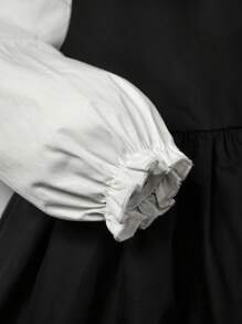 Cozy Pixies Đứa bé gái Cổ áo tương phản tay áo lá sen Nơ mặt trước Váy 2 trong 1 - Đen và trắng - Xem 5