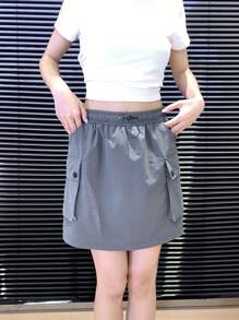 素色腰部抽繩翻蓋口袋工裝裙