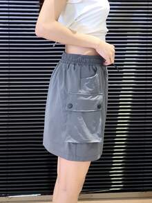 素色腰部抽繩翻蓋口袋工裝裙