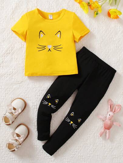 2 piezas/Set Niña joven Camiseta de algodón de manga corta con cuello redondo y estampado de gato, y pantalones casuales con estampado de gato negro, conjunto cómodo y de moda para primavera y verano