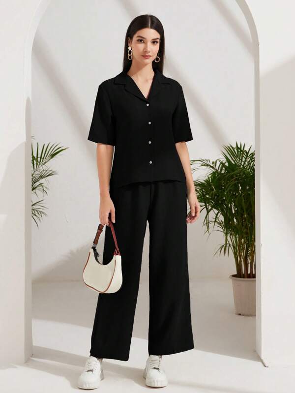 Mulvari Ensemble 2 pièces : blouse à boutons col châle et pantalon pattes d'éléphant