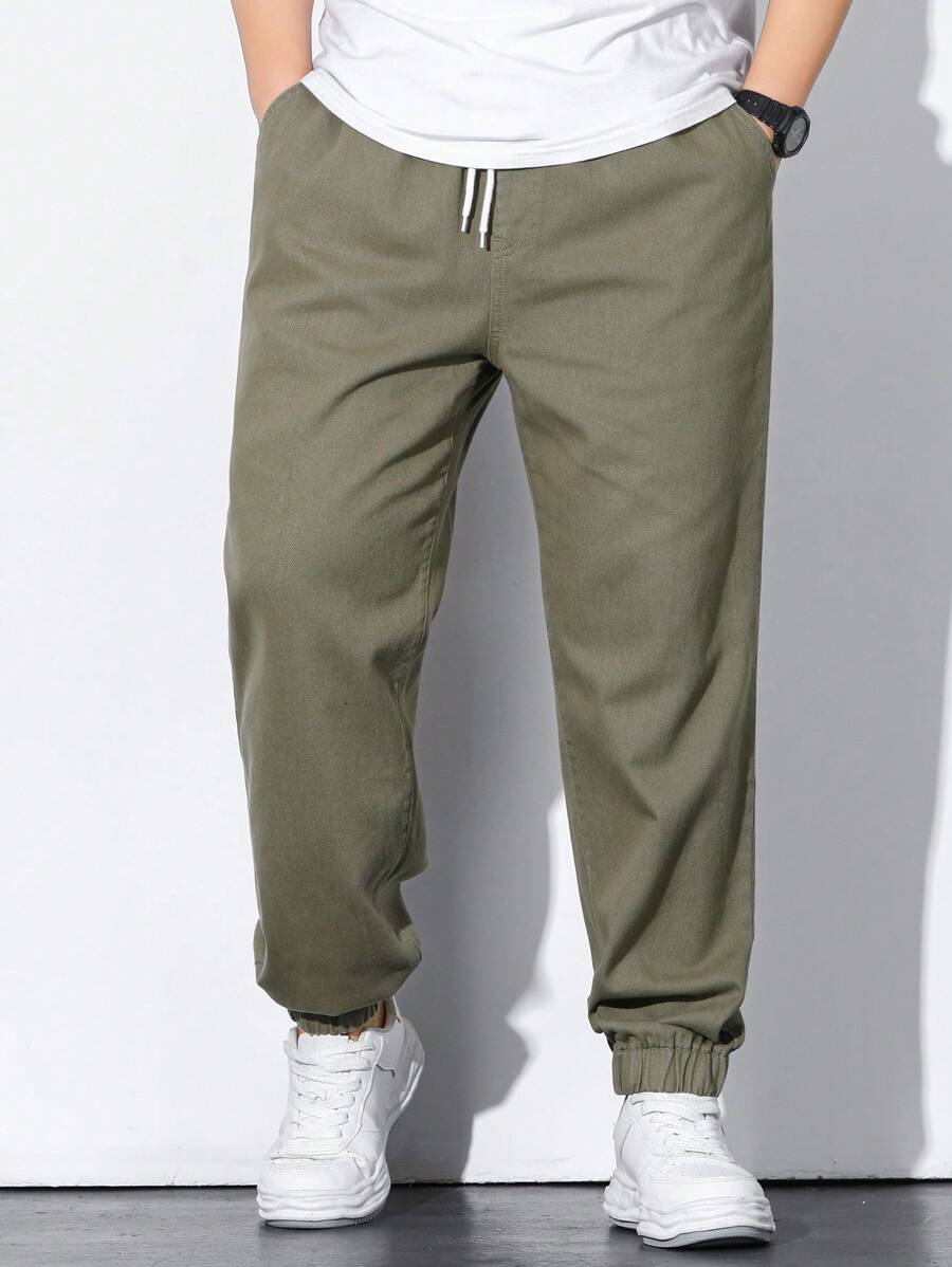Manfinity Homme Hombres talla grande Jeans joggers de cintura con cordón - Verde militar - Ver 1