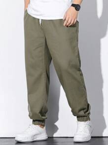 Manfinity Homme Hombres talla grande Jeans joggers de cintura con cordón - Verde militar - Ver 4