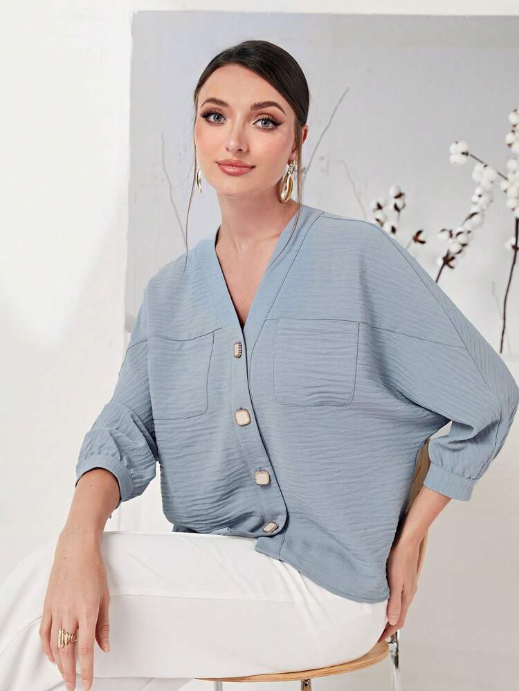 Dual Pocket Batwing Sleeve Button Front Blouse