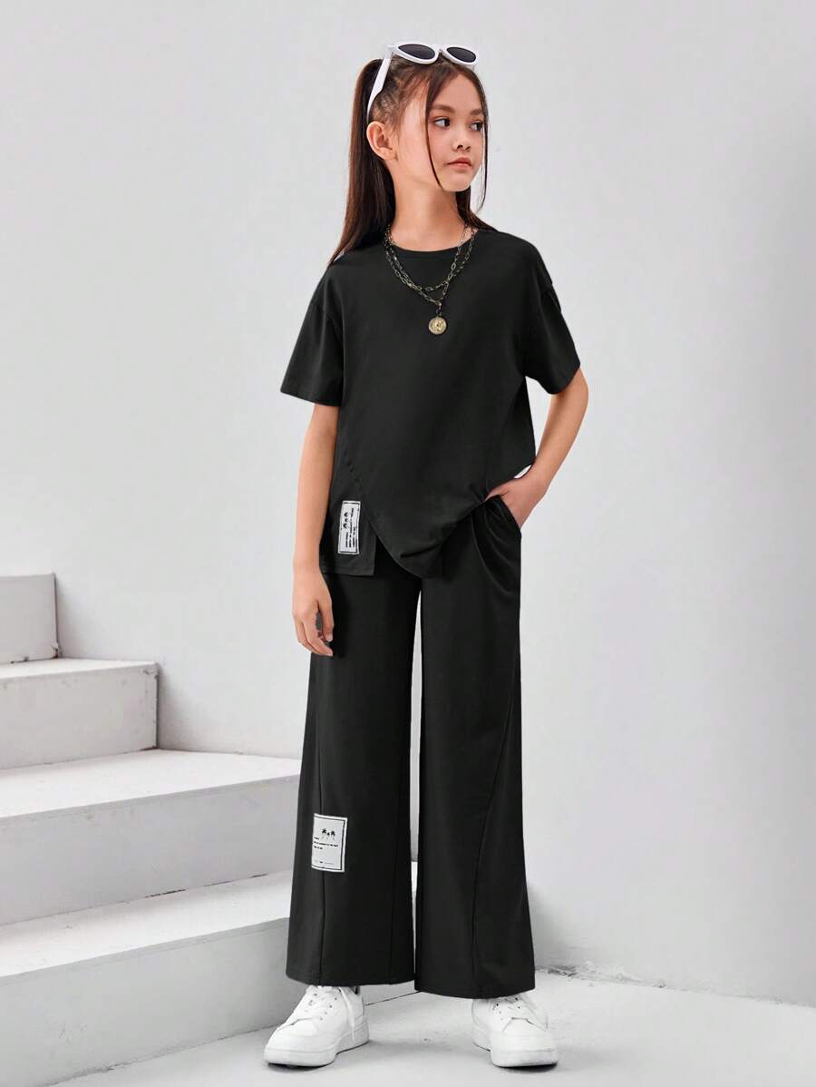 SHEIN Leap Crew 針對少女設計的短袖純色休閒套裝:字母拼接t恤和寬腿褲 - 黑色 - 查看 1