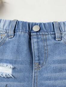 SHEIN Young Girl Cartoon & Letter Graphic Ripped Jeans - Light Wash - View 4