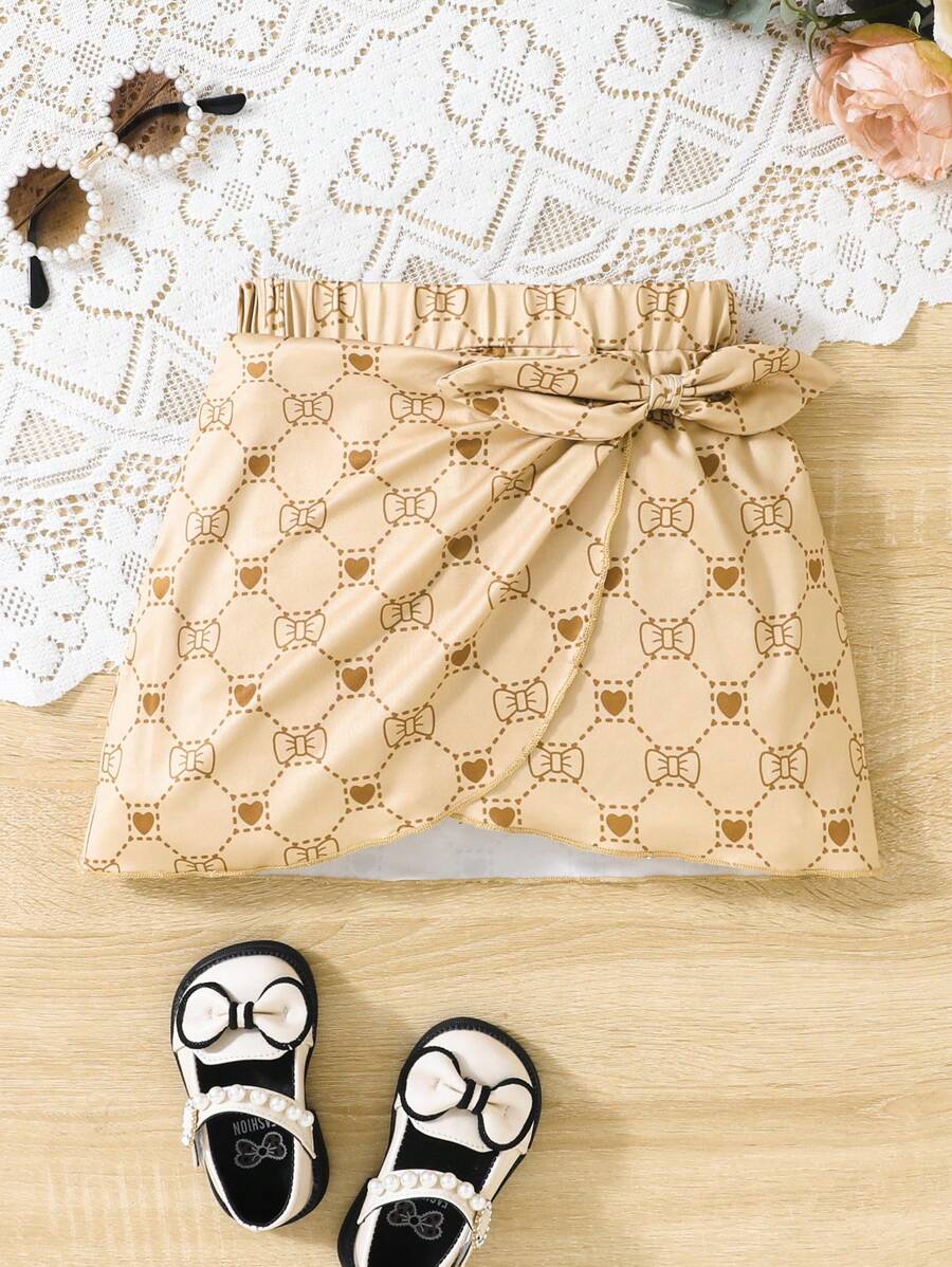 SHEIN Young Girl Allover Print Bow Front Wrap Hem Skirt - Khaki - View 1