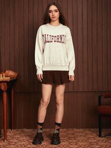 SWAVVY 1 Miếng Đồ họa Chữ cái Thả vai Áo len - Màu be - Xem 3