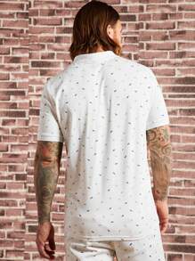 Manfinity NiteLyfe 男士滿版羽毛印花POLO衫