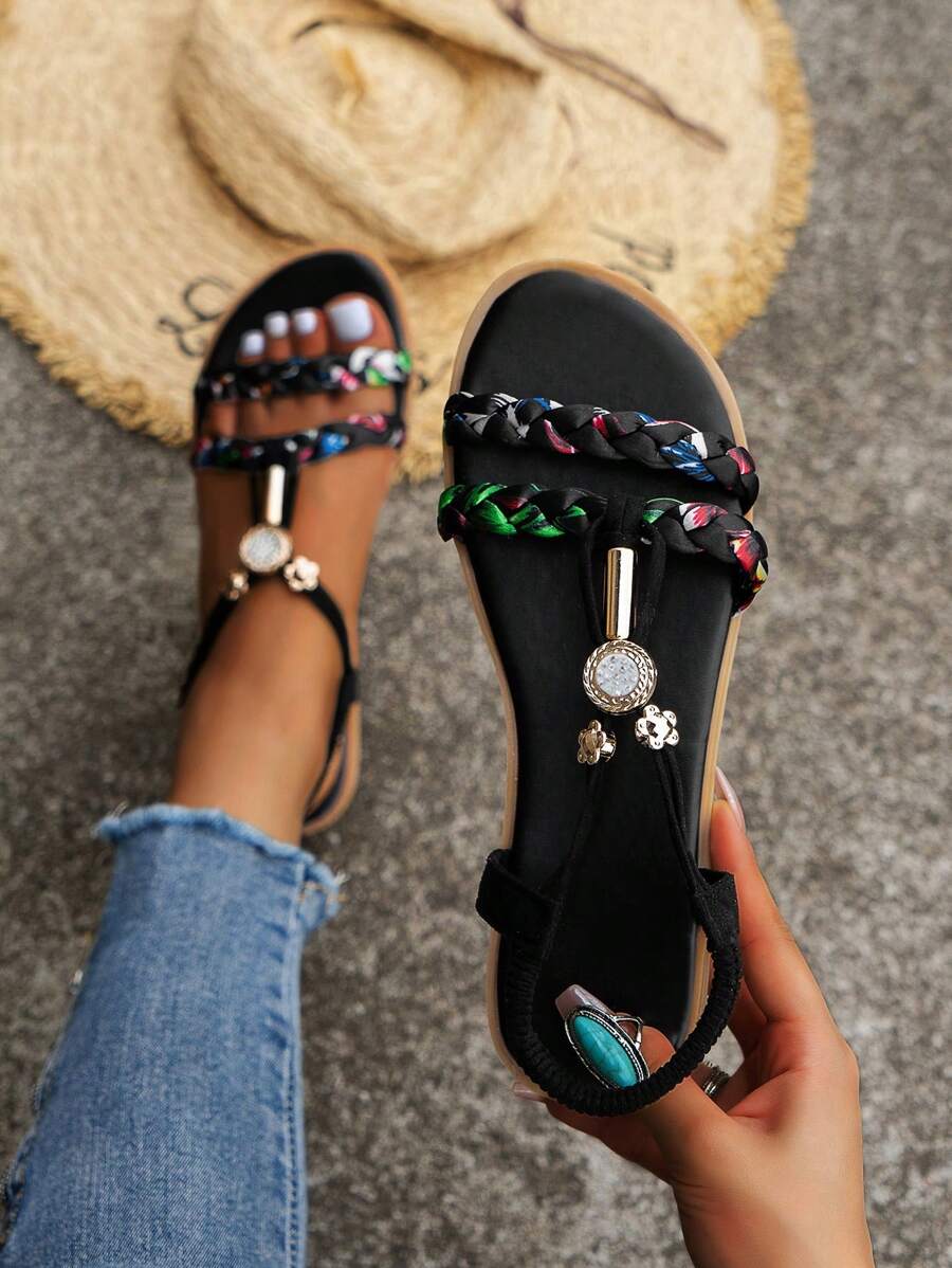 編織花朵設計涼鞋帶柔軟和防滑鞋底適用於海灘,黑色平底涼鞋適合女士