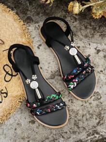 編織花朵設計涼鞋帶柔軟和防滑鞋底適用於海灘,黑色平底涼鞋適合女士