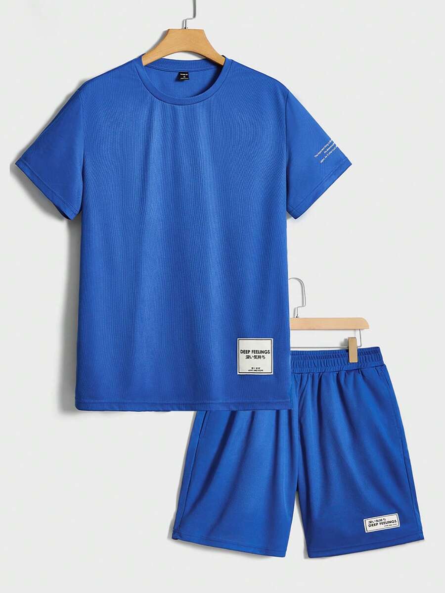 Manfinity VCAY Bộ áo phông và quần short in khẩu hiệu thường ngày dành cho nam, mùa hè - Xanh đậm - Xem 1