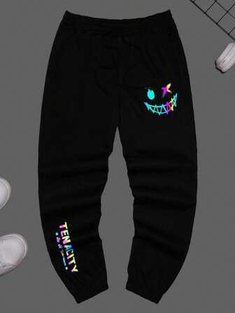 Manfinity RebelGame Pantalones para hombre Cordón Bolsillo Dibujos animados Letras Casual