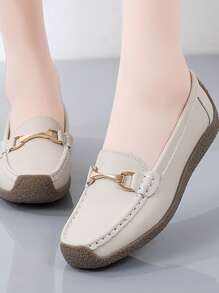 秋冬新款真皮低帮妈妈鞋金属扣平底鞋