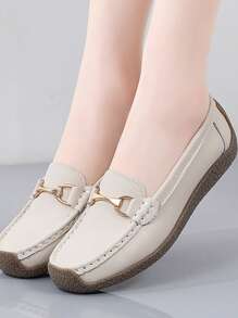 秋冬新款真皮低帮妈妈鞋金属扣平底鞋