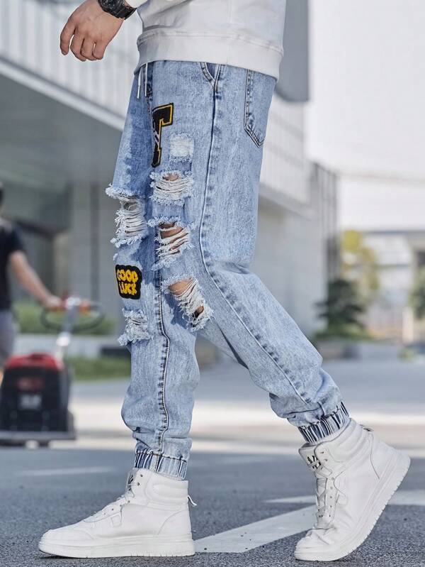 Manfinity Sporsity Men Cotton Letter Patched Ripped Jogger Jeans
