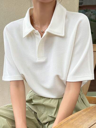 DAZY Top casual de negocios de manga corta con cuello polo de color liso para mujer