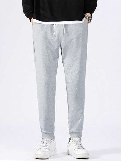 Hombres Pantalones de cintura con cordón con bolsillo oblicuo