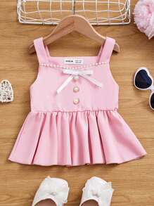 SHEIN Top de punto sin mangas con lazo decorativo y pliegues, de unicolor y tirantes anchos, para niña - Rosa Pálido - Ver 1