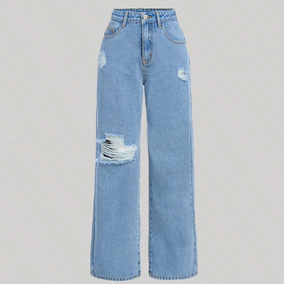Chica adolescente Jeans desgarro de pierna ancha