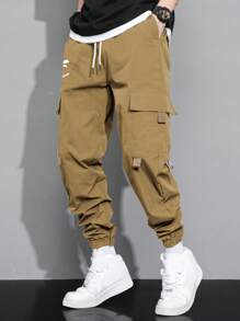Manfinity Hypemode Pantalones De Carga Sueltos Para Hombres Con Estampado De Expresión, Bolsillos De Solapa Y Cintura Con Cordón