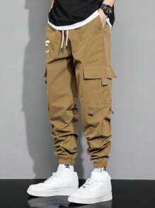 Manfinity Hypemode Pantalones De Carga Sueltos Para Hombres Con Estampado De Expresión, Bolsillos De Solapa Y Cintura Con Cordón