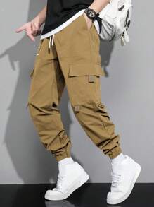 Manfinity Hypemode Pantalones De Carga Sueltos Para Hombres Con Estampado De Expresión, Bolsillos De Solapa Y Cintura Con Cordón