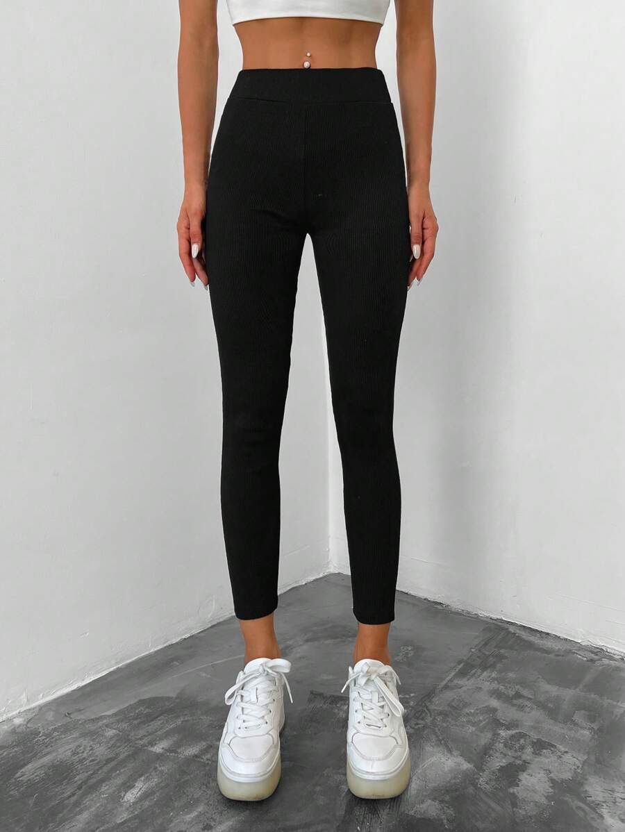 EURMUSE Nine-Quarter Length High-Waisted Solid Color Casual Leggings - Black - View 1