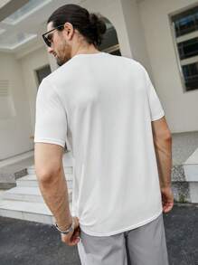 Manfinity Homme Uomo Maglietta monocolore con scollo a V