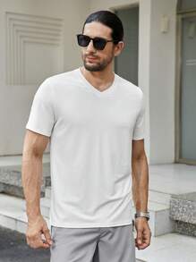 Manfinity Homme Uomo Maglietta monocolore con scollo a V