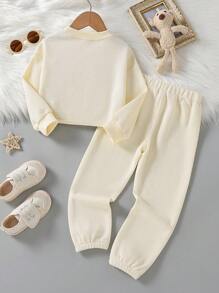 SHEIN 女小童休閒杏華夫鬆餅棋盤格套裝,包括3D圖案熊點綴運動衫和長款長褲適用於秋天