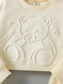 SHEIN 女小童休閒杏華夫鬆餅棋盤格套裝,包括3D圖案熊點綴運動衫和長款長褲適用於秋天