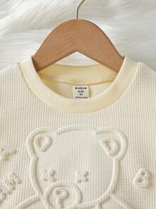 SHEIN 女小童休閒杏華夫鬆餅棋盤格套裝,包括3D圖案熊點綴運動衫和長款長褲適用於秋天