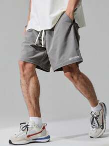 Manfinity Homme Pantalones Cortos Sueltos De Cintura Con Cordón Y Gráfico De Letra Para Hombre De Talla Grande - Gris - Ver 1