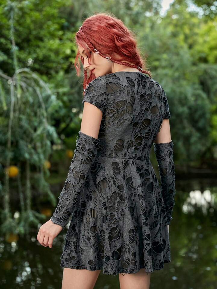 Our Cut Out Ripped Dress With Arm Sleeves is such a vibe