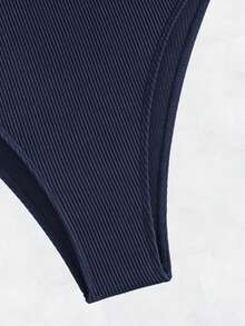 肩上打結鋼圈連體泳衣