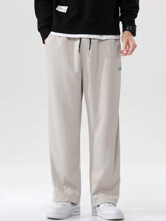 Hombres Pantalones con diseño de parche de letra de cintura con cordón