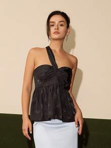 Top peplum de un hombro girante delantero
