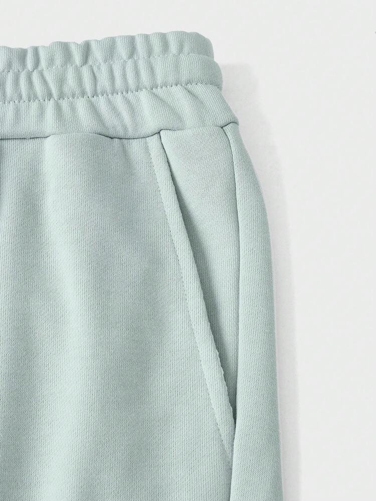 Men Drawstring Waist Seam Front Sweatpants