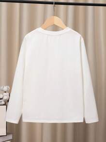 SHEIN Camiseta deportiva para niño preadolescente de cuello redondo, manga larga y corte holgado, cómoda, con patrones de dibujos animados. - Blanco - Ver 2